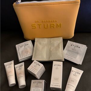 Dr. Barbara Sturm Yellow Cosmetic Bag and Travel Size Skincare Set